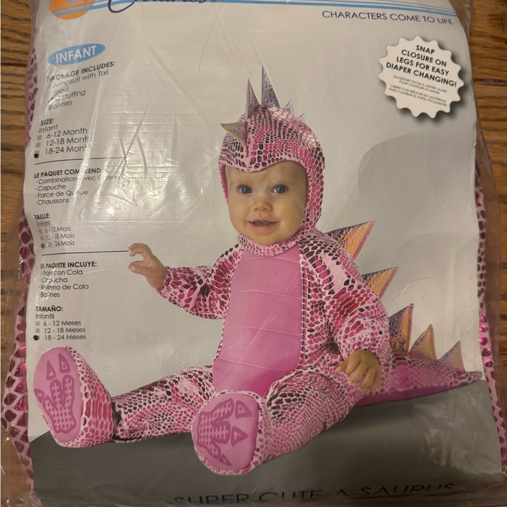 18-24 month dinosaur costume. Never worn. Brand new in package.